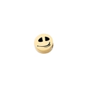 Macro shot of golden stainless steel bead with Jack Skellington smile face engraving - Expression 5