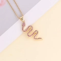 Close-up of a gold snake pendant necklace featuring vibrant pink micro-set zircon stones - Full Pink Zirconia Snake Style (8#)