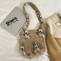 Close-up of beige plush tote bag with cute rabbit pattern and small miss bag tag - Khaki Rabbit