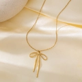 Elegant 18k gold stainless steel necklace with a minimalist bow pendant on silk - Bowknot Necklace (QYH336) / Gold
