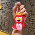 Kapybara keychain in festive red dragon zodiac costume with lucky heart charm - Auspicious Snake Face Changing Doll - Red