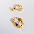 Minimalist twisted irregular geometric hoop earrings in polished gold metallic finish - Gold