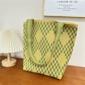 Close-up of yellow and green checkered knit tote bag on a wooden table with lamp - 16 Small Diamond Yellow