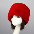 Detail of red faux fur Cossack hat with thick fluffy texture on a model head - Red Faux Rex Rabbit Fox