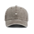 Detailed view of white letter R embroidery on vintage washed cotton baseball cap - Coffee
