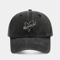 Close-up of Mama embroidery and heart on a washed black cotton baseball cap - Heart Mama Black