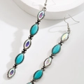 Detail of bohemian turquoise drop earrings with vintage silver metal and AB crystals - Long AB Green