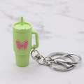 Light green Stanley cup style soft rubber keychain with pink butterfly decoration - Green Butterfly Cup Keychain