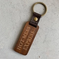 Vintage wooden keychain with American flag style leather loop and Hot Mess Express engraving - Hot Mess Express / Brown