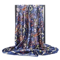 Blue paisley silk scarf 90x90cm with vibrant floral print on professional display - Navy Paisley