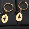 14K gold plated hoop earrings featuring blue faceted beads and star-etched oval pendants - Oval Four-pointed Star Black Rice Beads