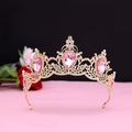 Detail of golden baroque crown featuring pink pear-shaped gemstones and white rhinestones - No.11 KC Gold (Pink Stone)
