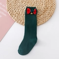 Detail of baby knee-high socks in dark green with red bow and gold bell ornament - L 1-3 Years Old / Dark Green (Red Green Bell)
