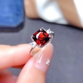 Silver ring featuring a square red gemstone and white zircons held by fingers - Platinum Ljz-273 / Adjustable Open