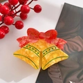 Pinza per capelli natalizia con campanelli marmorizzati gialli e fiocco rosso traslucido - Campana di Natale Rossa