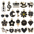 Assorted black and white enamel DIY charms featuring music, animals, and floral shapes - 20Pcs Mixed Black Enamel Charms
