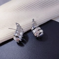 Polierte silberne Spiral-Ohrstecker in Tropfenform mit minimalistischem 3D-Design - Silber