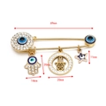 Detailed view of the 69mm gold evil eye brooch dimensions with Hamsa hand charms - Gold Star - Hamsa Hand