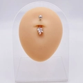 Silver stainless steel belly ring with transparent marquise leaf pendant on model - Streamlined Leaf Pendant
