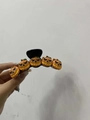 Orange pumpkin claw clip with five mini Jack-o'-lanterns for Halloween hair styling - 10.5cm Smile Pumpkin Black