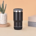Detail showing the non-slip bottom and gear-shaped silicone ring of the black can cooler - 14oz / Black Bluetooth Speaker Model