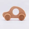 Handcrafted walnut wood car toy for babies with a smooth natural grain and easy-grip hole - Beech Wood Car