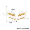 Golden titanium wing earrings with white oil drip finish and geometric design - White Gold Style (F1568)