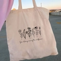 Off-white canvas tote bag featuring retro wildflower print and handwritten text design - STD874-Q Among The Wildflowers