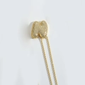 Puffy golden letter N pendant necklace encrusted with sparkling rhinestones on a twist chain - Letter N