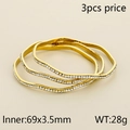 Set of three wave-shaped gold-plated titanium steel bangles with sparkling crystals - 3Pcs Wave Rhinestone Set (KB79566-LO)