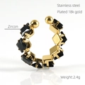 Macro shot of 18k gold plated stainless steel ring with black zircon stone details - Adjustable Open / Black Zirconia
