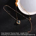 Titanium steel heart necklace featuring a dark blue crystal pendant and diamond accents - Gold with Blue Heart