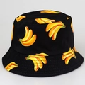 Reversible bucket hat in black with vibrant yellow banana print for sun protection - M / Black Banana