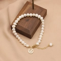 Natural pearl bracelet with gold Fu pendant and adjustable chain in light luxury style - Fortune Charm Pearl Bracelet