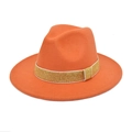 Detailed view of the orange wool fedora hat featuring a sparkling gold decorative ribbon - Orange