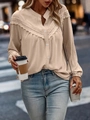 Elegante abrikooskleurige blouse met lange mouwen, kantwerk en witte knopen erop - S / Abrikoos