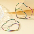 Rainbow stainless steel heart hoop earrings with vibrant gradient finish for women - Double Nested Heart / Iridescent
