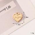 Detailed view of heart-shaped gold pendant with I Love You engraving and beaded edges - C289 16mm Gold I Love You Heart