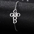 Makro-Detail von Edelstahl-Armband in Silber mit Gravur von Kreuz sowie GOD und GOOD - Massives Kreuz (God Is Good)