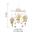 Baby mobile with three egg-shaped plush toys, wooden beads and rings, #3 Ruffed Eggs - Poached Egg Mobile
