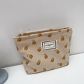 Corduroy travel makeup bag with pineapple print and zipper closure in beige - Khaki Pineapple