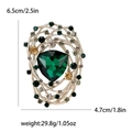 Vintage nest brooch with large green triangular gemstone and gold woven texture - Green