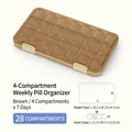 Brown 28-compartment weekly pill organizer with 7 individual boxes and size specs - U477 Brown 28-Grid