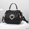 Quilted black shell-shaped handbag with golden crown heart clasp and adjustable strap - Black