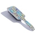 Square hairbrush featuring tropical leopard print and palm leaves on a black cushion - Colorful Spots