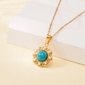 Gold flower necklace featuring turquoise center and pearl accents on white display - Pearl Halo Flower Turquoise Style (137524)