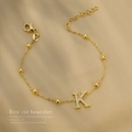 Elegantes Damenarmband aus Titanstahl in Gold mit Buchstaben-K-Anhänger und Zirkonia - Buchstabe K Stil (B0012K)