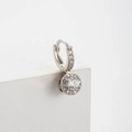 Silver bow-shaped hoop earring with sparkling zircons on a white display block - Round White Zirconia Style(A170-4#)