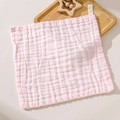 Pink gauze baby washcloth with waffle texture and wooden teething star toy - Pink