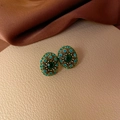 Detailed shot of vintage gold earrings with green gemstones and blue crystal pavé - 32# Stud Earrings-Antique Gold-Green Rhinestone